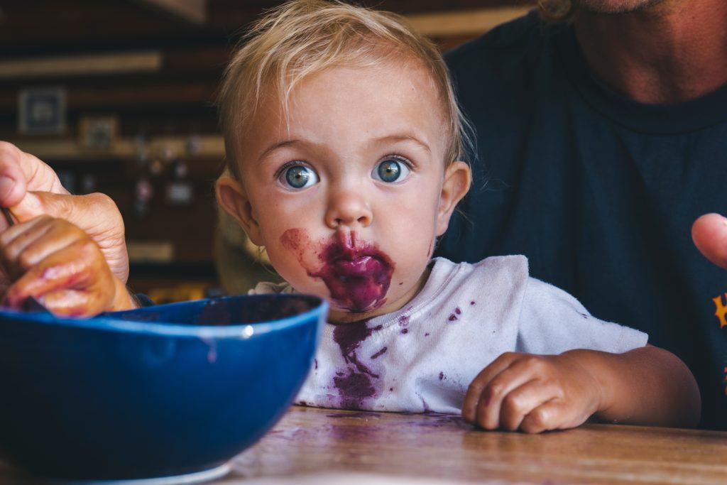 baby at table with food on face, instagram accounts for feeding kids