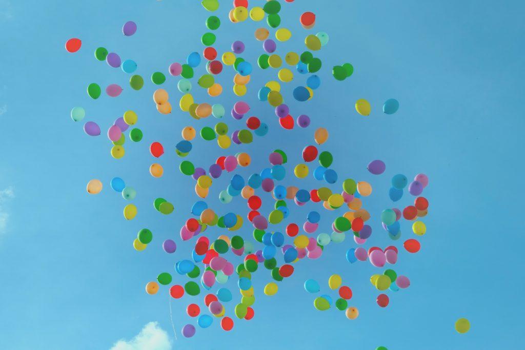Balloons in sky, raising more positive kids