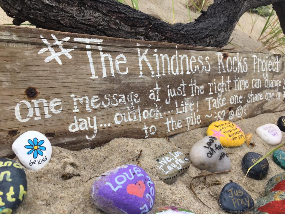 painted rocks on beach with sign, kindness rocks on cape cod
