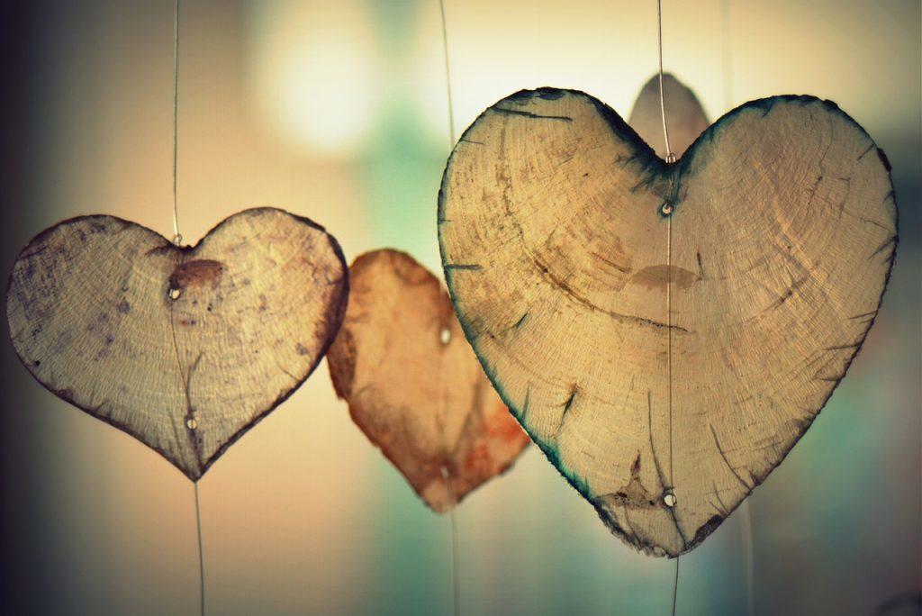 wooden hearts hanging up, motherhood this way