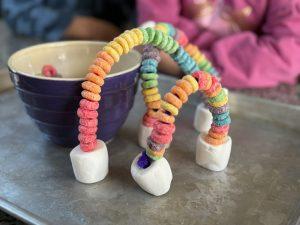 rainbows made from froot loops, marshmallows, and pipe cleaners