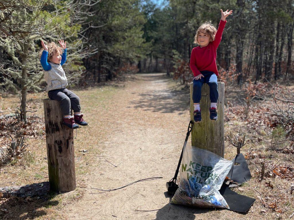 Kids celebrating after a clean-up along a Cape Cod trail